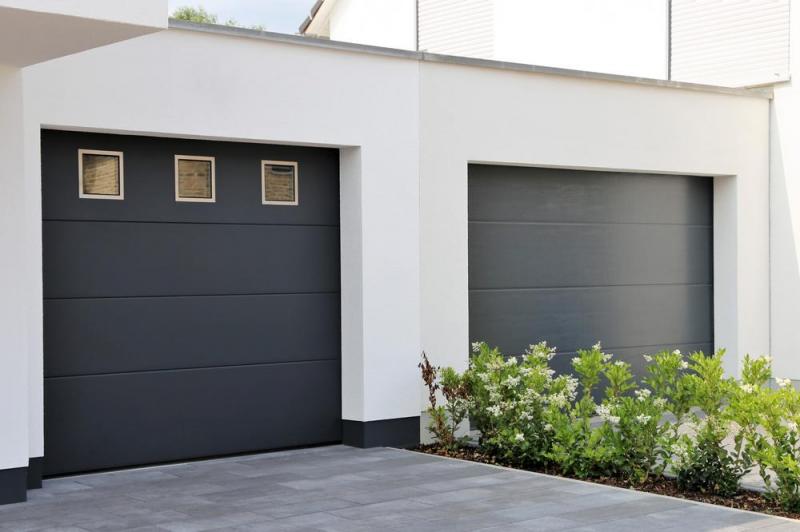 Quel gain de place apporte une porte de garage sectionnelle ?